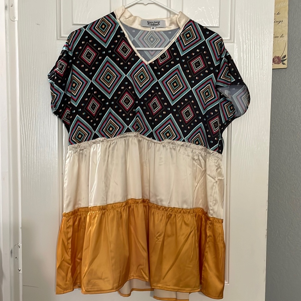 Aztec, cream and gold top. Size med.